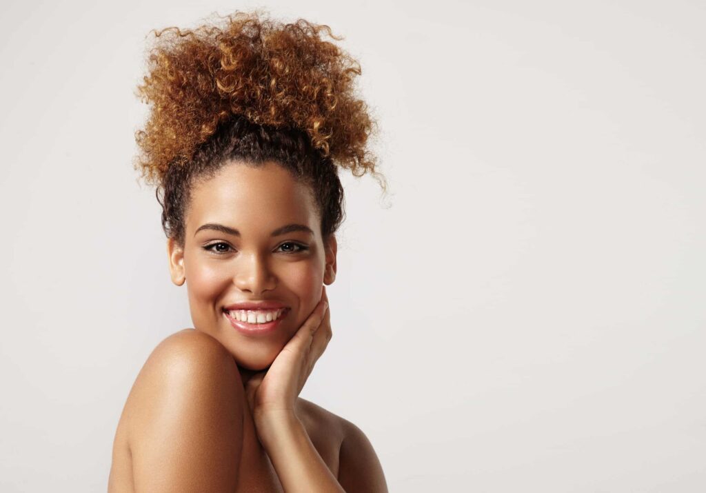 closeup portrait of a black woman with ideal skin