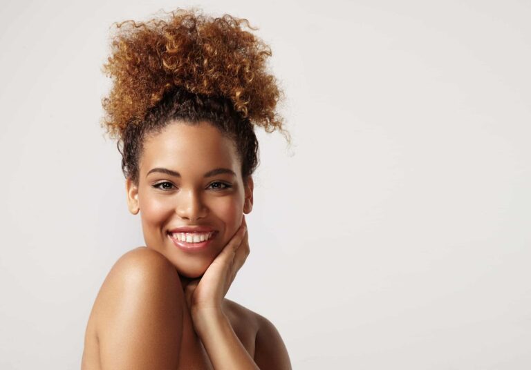 closeup portrait of a black woman with ideal skin
